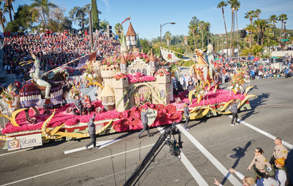 Crowd watching TSF float drive by