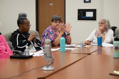 Women at a table at the listening session in Pittsburgh, PA for ICC
